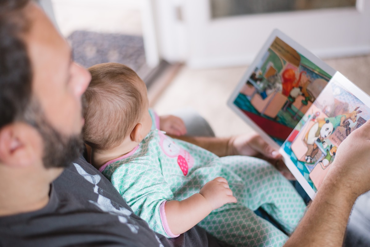 A parent and child reading together